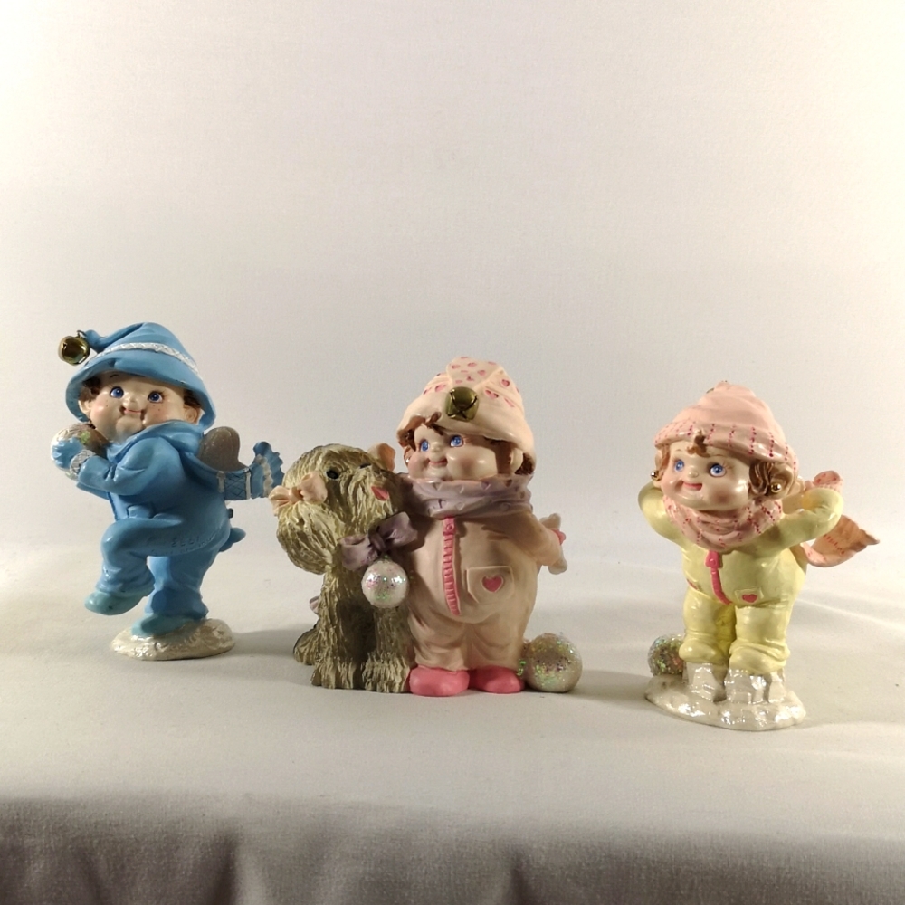 Vintage 1993 Set of Three Roman Inc Winter Figurines with Wings & Bells
